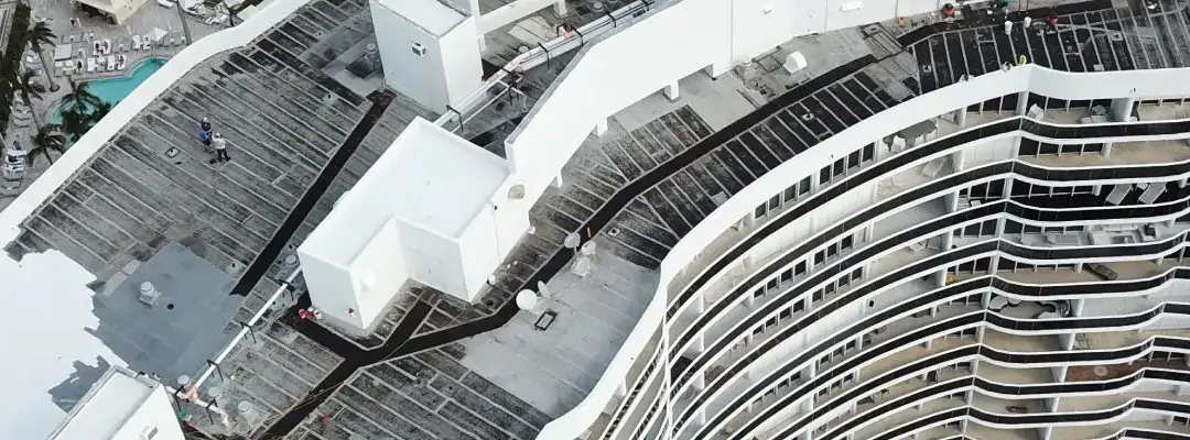 Aerial photograph of a large South Florida building-envelope project published on the Perkins company page.