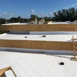 Four photographs from Perkins Roofing’s flat-roof residence project record in South Florida. Photograph 2 of 4.