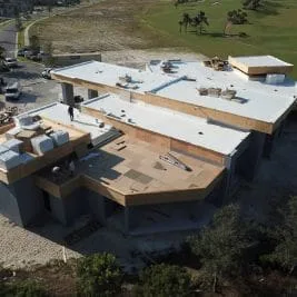 Four photographs from Perkins Roofing’s flat-roof residence project record in South Florida. Photograph 3 of 4.