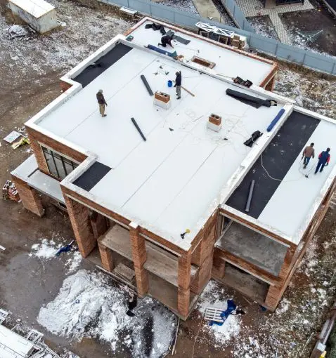 Flat-roof photograph published on Perkins Roofing’s flat-roofing service page.